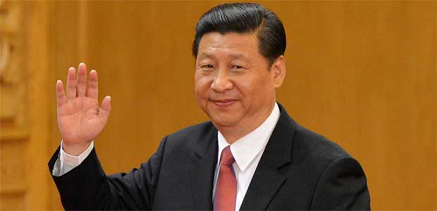 Xi Jinping acena ao ser escolhido líder do Partido Comunista da China (AFP PHOTO/Mark RALSTON )