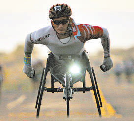 Cadeirante em competição: suporte percebido comosubstitutodas pernas (HUGH GENTRY/REUTERS - 14/10/12)