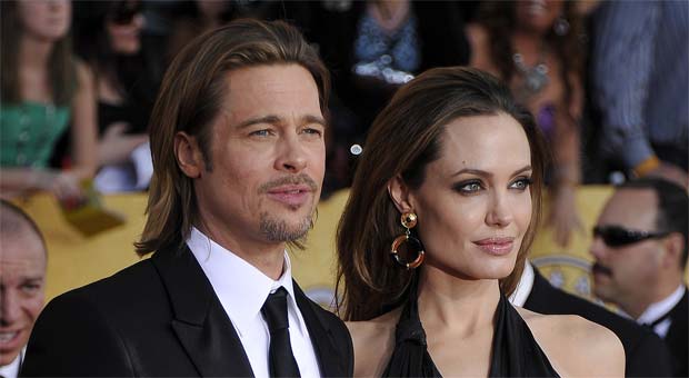 Brad Pitt elogiou a coragem da esposa por retirar as mamas para evitar o risco de câncer (AFP PHOTO / JOE KLAMAR )